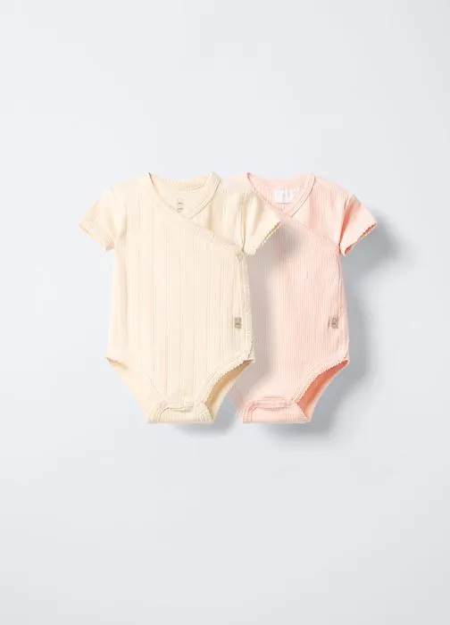 Paket od 2 rebrasta križna bodija za bebe